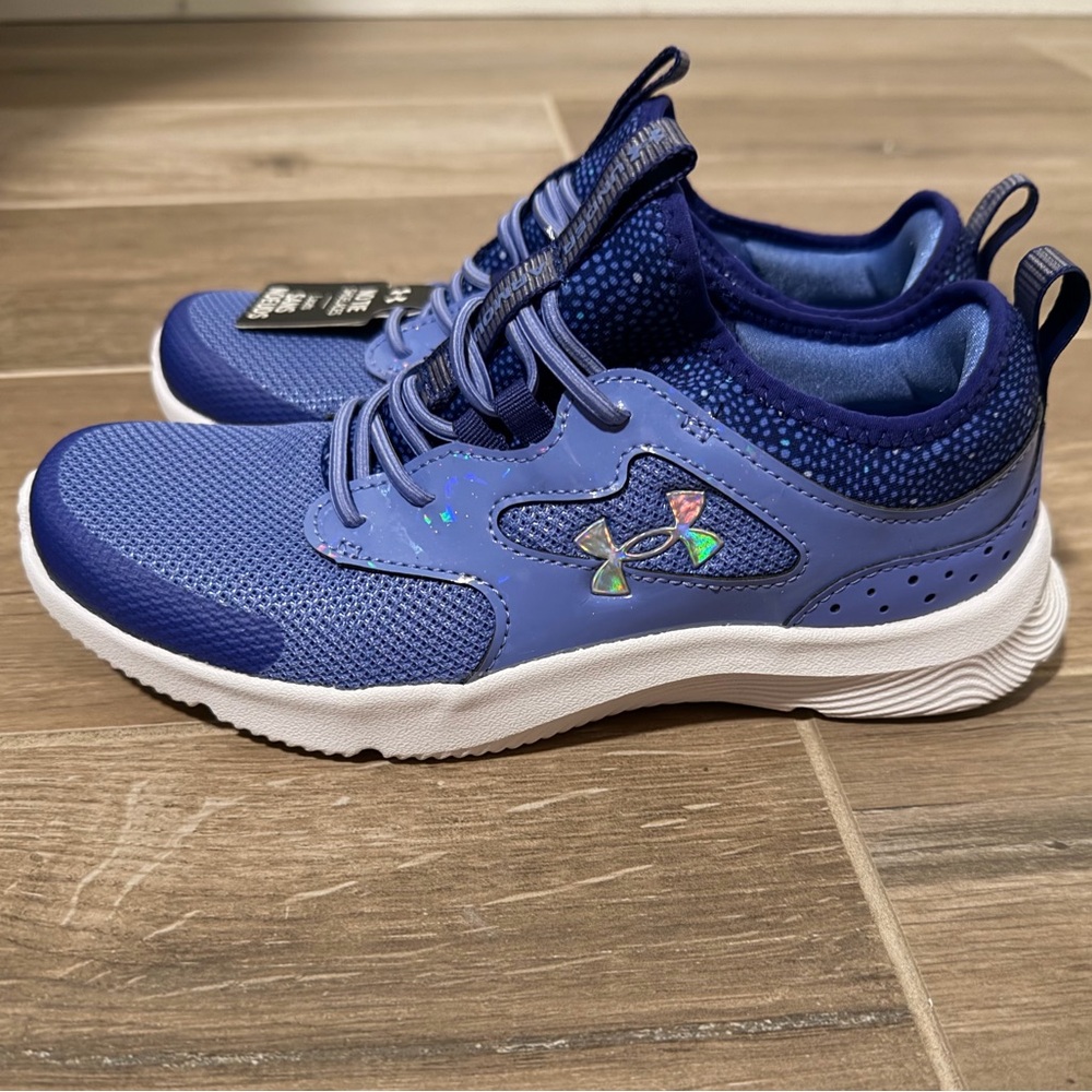 Under Armour purple Athletic Shoes. Pull on. Never worn. Box included.